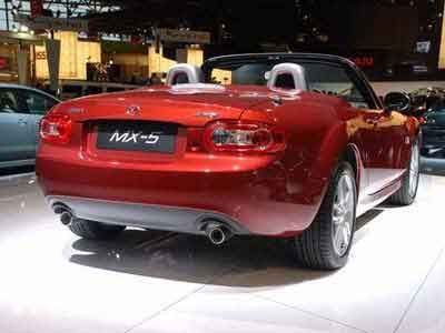 The convertible hard top Mazda MX 5 is the world's fastest Roadster Coupe . Perfect 10, get noticed.